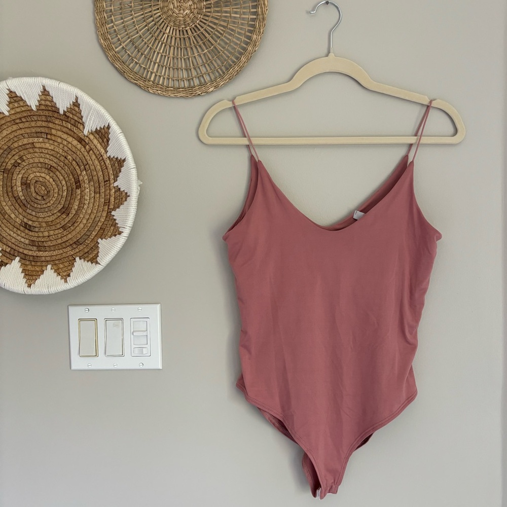Pink bodysuit